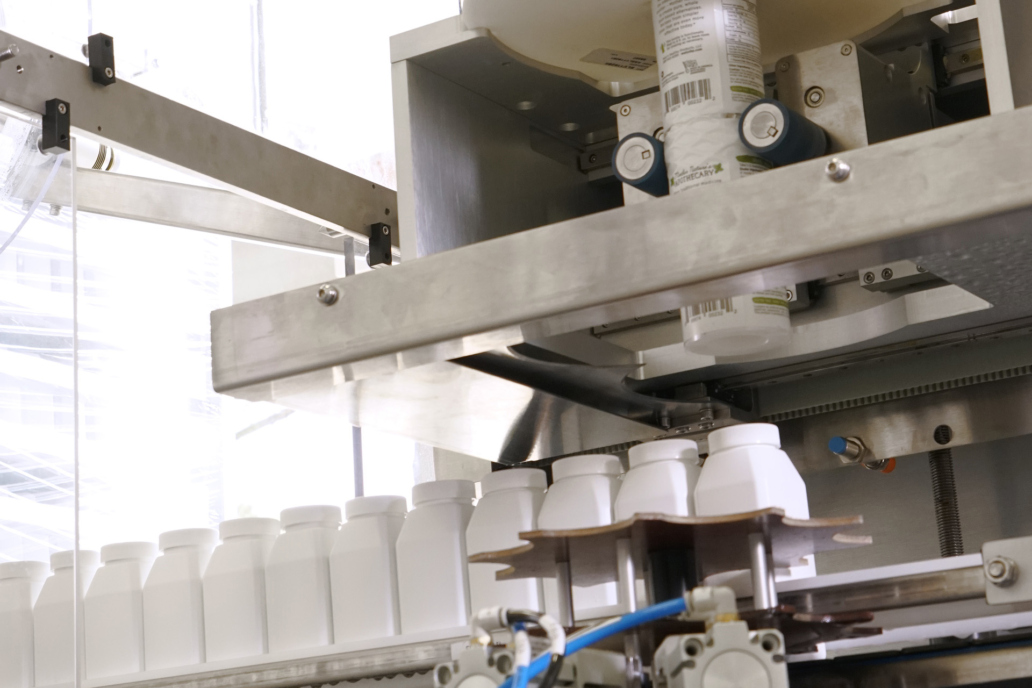 Dietary Supplements - Shrink wrap label machine