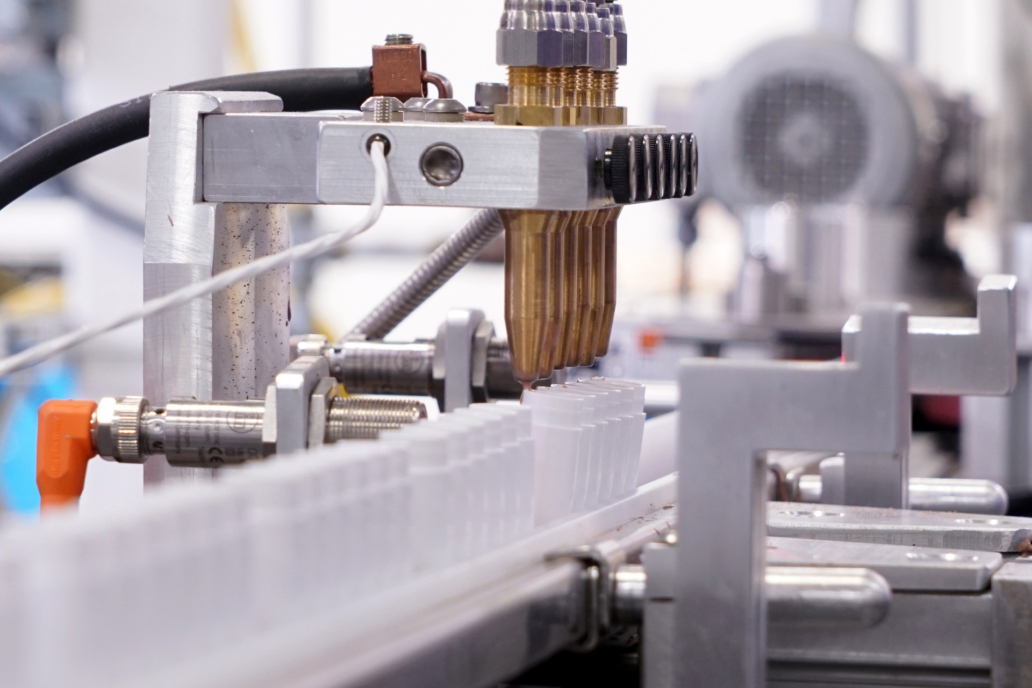 Cosmeceutical Lip balm tubes being filled